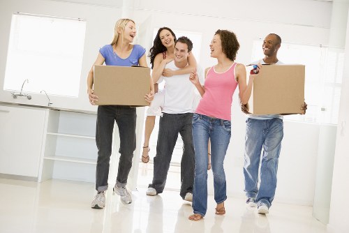 Office removals planning in Highbury with moving boxes and business equipment
