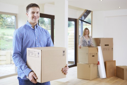 Careful furniture handling during a local removal in Highbury
