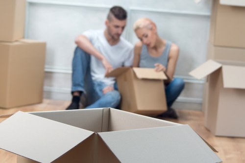 Team preparing a local relocation in Highbury with boxes and furniture