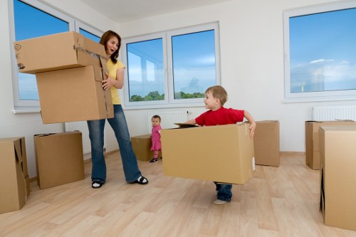 Staff trained to lift and carry items safely during a house move