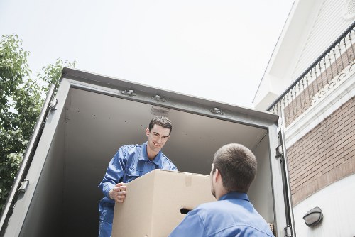 Loading furniture into a removal truck for a local move