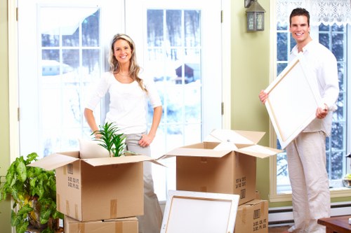Loading furniture into a removals truck in Highbury