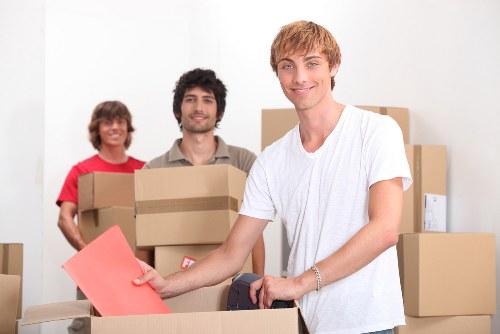 Loading furniture and boxes into a van for a Highbury move