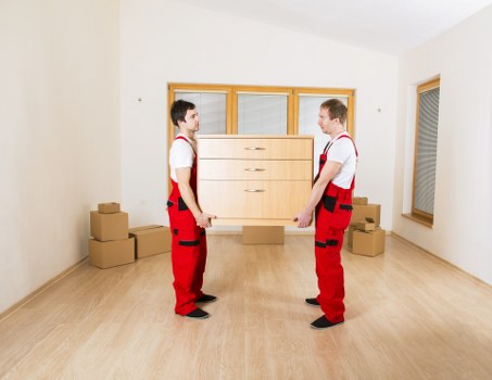 Moving team loading household items for a local Highbury relocation